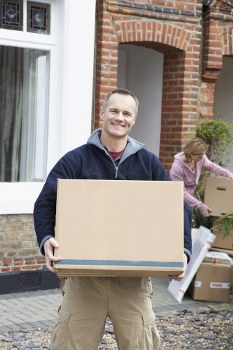Professional house removals team working in a Marylebone residential street